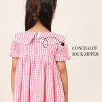 Girls pink gingham dress back view