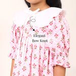 Pink floral cotton dress for girls with statement Peter Pan collar and frill accents